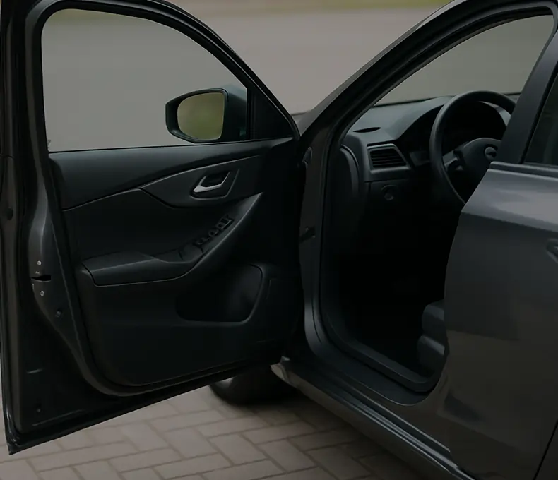 Technician unlocking car door in Houston TX Open Car Door Houston TX